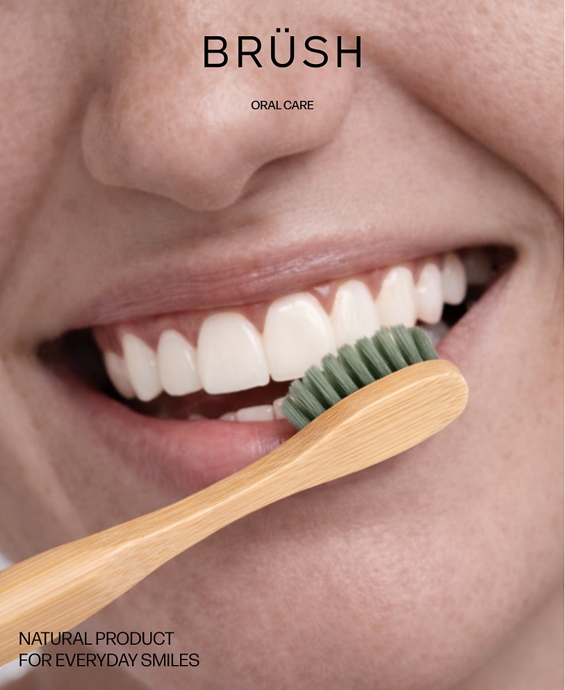 Visuel Brüsh montrant un sourire et une brosse à dents.