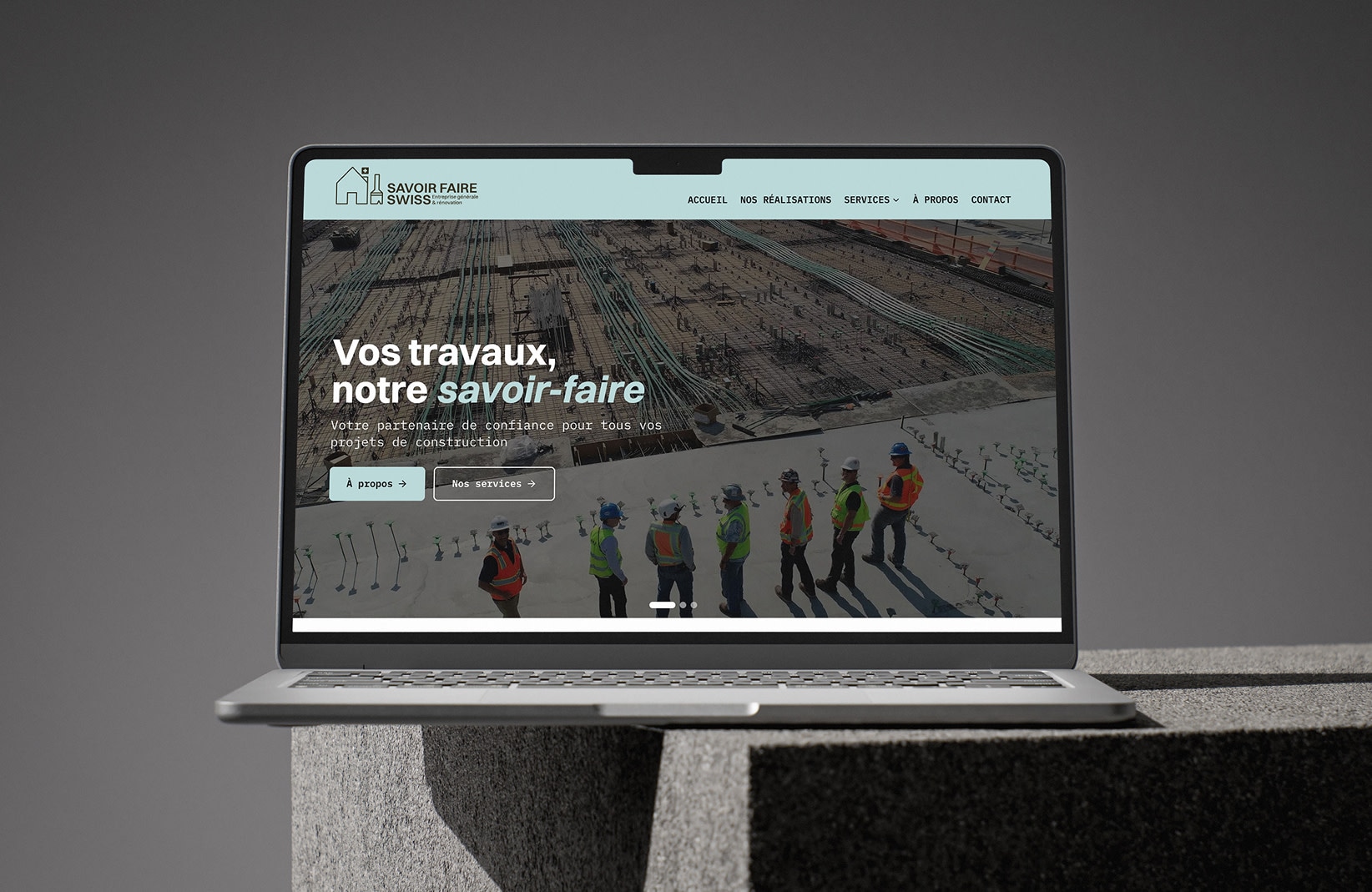 Accueil du site Savoir Faire Swiss sur un ordinateur portable.